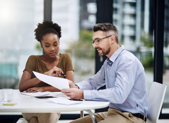 college tutor working with a student